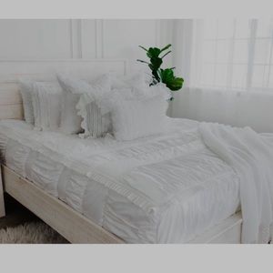 Beddys queen white comforter set. Bought new. Used 1 year.